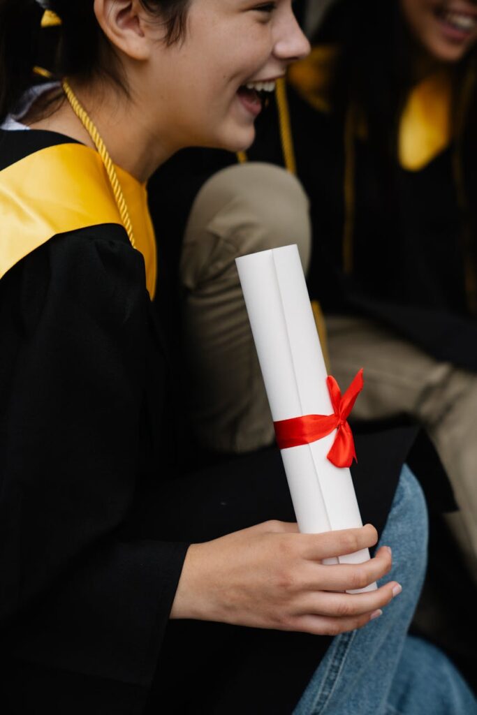 woman holding a diploma